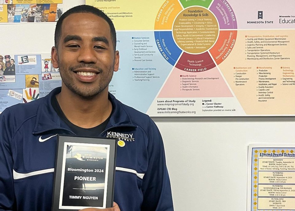 Timmy Nguyen with award plaque